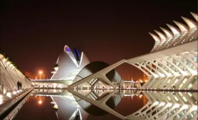 a view of a building at night at BEACH VALENCIA LUXURY A40-13 Apartment with terrace and sea views in Valencia