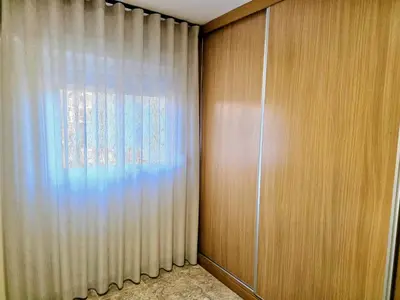 a room with a curtain and a window at Entire Apartment near Valencia - 2 Bedrooms & 2 Bathrooms in Paterna