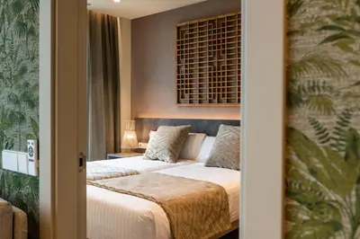 a bedroom with a bed in a room at Apartamentos Core Suites Valencia in Valencia