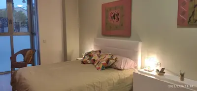 a bedroom with a bed with two pillows on it at Sunny&Beach in Valencia in Valencia