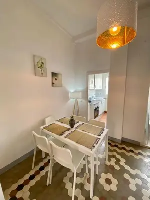 a living room with a couch and a table at Ruzafa Vibes Apartments in Valencia