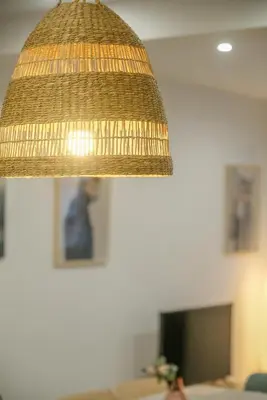 a close up of a hanging light in a living room at Apartment with Open-air Space in Valencia