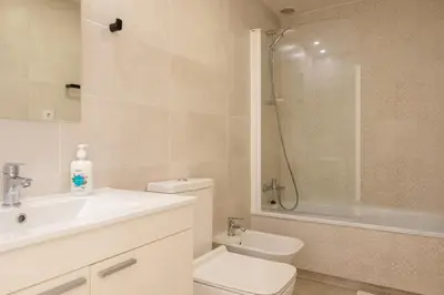 a bathroom with a sink and a toilet and a shower at Apartment with Open-air Space in Valencia