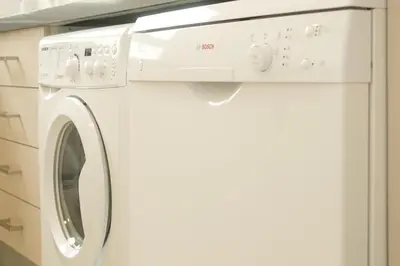 a white washer and dryer in a kitchen at Spacious Penthouse with Private Terrace in Valencia