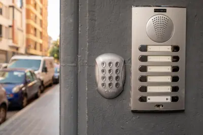 a remote control attached to the side of a building at Spacious & Clean Apartment in Quiet Area in Valencia