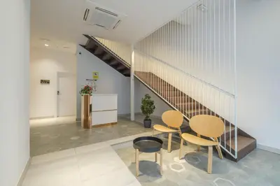 a room with a table and chairs and a staircase at Marvellous Apt with a Large Private Terrace in Valencia