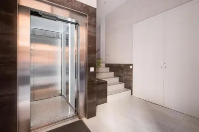 a walk in shower in a bathroom with stairs at Bright, Brand new & Very Comfortable Apartment in Valencia