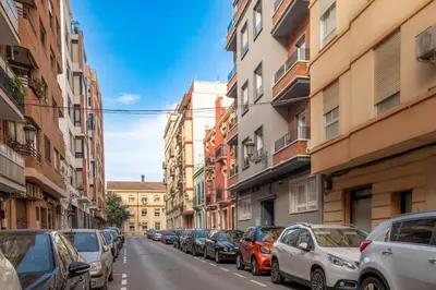 a city street with cars parked on the street at Bright, Brand new & Very Comfortable Apartment in Valencia