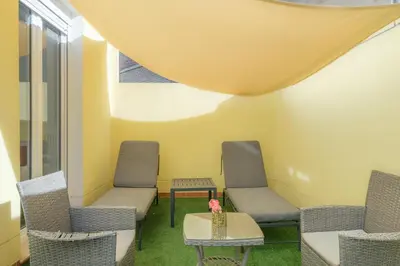 a waiting room with two chairs and a table at Gorgeous Apt with a Large Private Terrace in Valencia