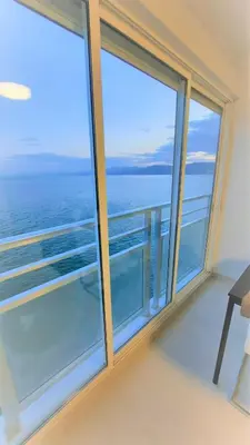 a balcony with a view of the ocean at Fantastico apartamento Faro de cullera a primera linea mar abierto playa de los olivos in Faro de Cullera