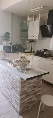 a kitchen with a counter with a bowl on it at VALENCIA in Valencia
