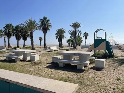 a swimming pool on the roof of a building at Apart. Port Arenal con terraza y piscina in Burriana