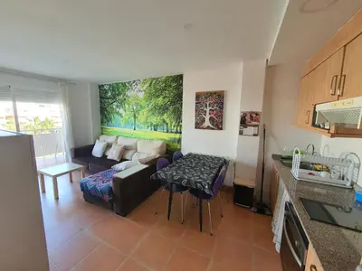 a living room with a couch and a table at Apartamento Almenara Nova Almenareta in Almenara