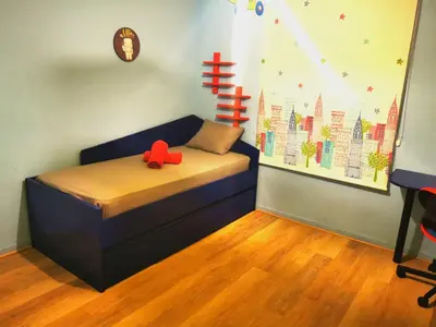 a bedroom with a bed with a red bow on it at Apartamento a 5 minutos distancia de playa en Puerto de Sagunto -Full Apartment -120m2 in Puerto de Sagunto