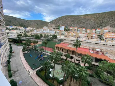 a view of a city with palm trees and buildings at Florazar 2 Cullera in Cullera