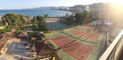 an aerial view of two tennis courts on a beach at Florazar 2 Cullera in Cullera