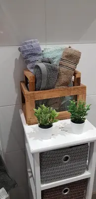 a white table with two potted plants on it at Apartamento C2 1Dormitorio in Lliria