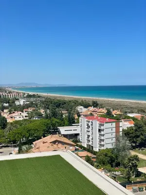 an aerial view of a building and the beach at Canet De Berenguer, Playa Apto con 2 habitaciones in Valencia