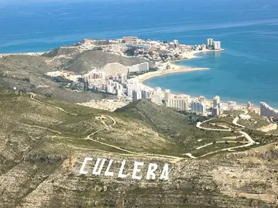 an aerial view of a city on top of a mountain at Precioso y gran apartamento en Cullera in Cullera