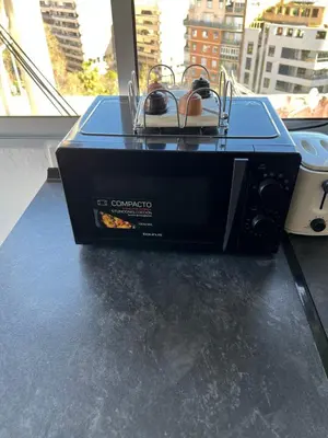 a black box sitting on a table in front of a window at Attic Loft Gran Vía in Valencia