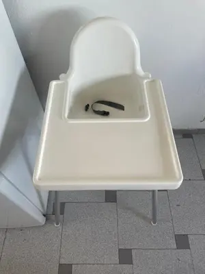 a white bench with a pair of scissors sitting on it at Attic Loft Gran Vía in Valencia