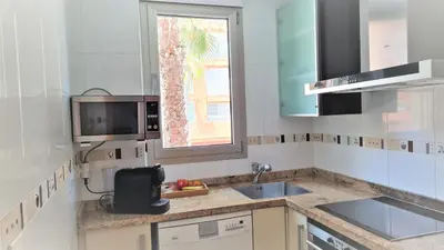 a kitchen with a sink and a window at BEACH VALENCIA LUXURY - B40-21 - Apartament on Beach in Valencia