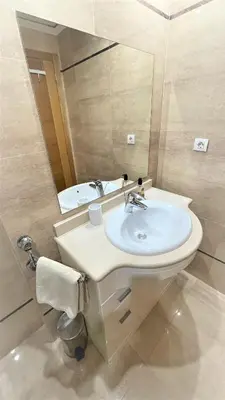 a bathroom with a sink and a mirror at BEACH VALENCIA LUXURY - B40-21 - Apartament on Beach in Valencia