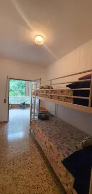a bedroom with two bunk beds in a room at La Chirrichana in Bicorp