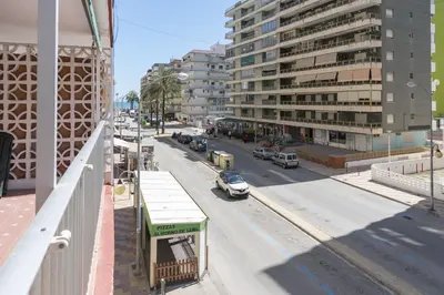 a view of a city street with cars and buildings at Saint Germain, A-2-4 in Cullera