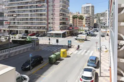 a city street with cars parked on the street at Saint Germain, A-2-4 in Cullera