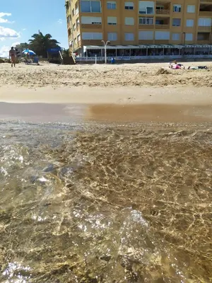 a view of the beach from the water at Town center Apartment El Perello Valencia in El Perelló