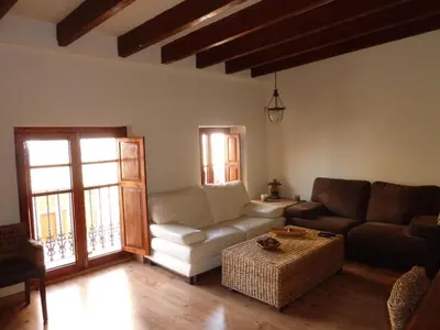 a living room with a couch and a table at Apartamento con encanto CORONA in Valencia