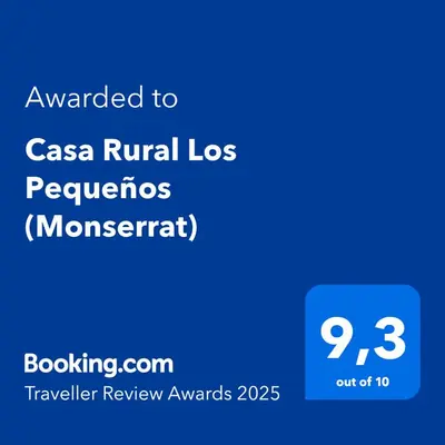 a screenshot of a cell phone with the text awarded to casa rural los responders at Casa Rural Los Pequeños (Monserrat) in Monserrat