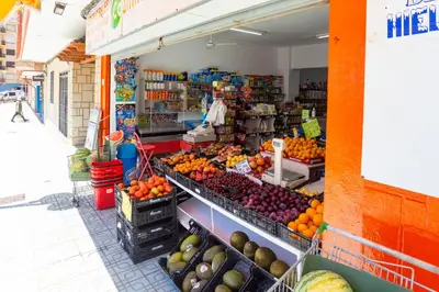 a market with fruits and vegetables on display at Cullera Apartment Faro in Cullera