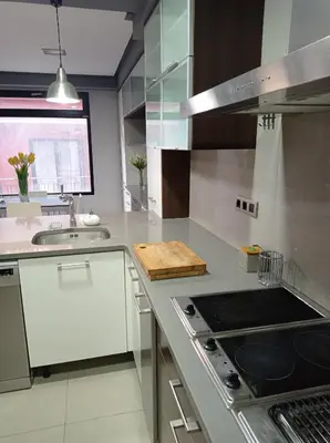 a kitchen with a sink and a stove top oven at CA PEPICA in Anna