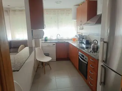 a small kitchen with a sink and a stove at Apartamento Casa Camacho in Burriana
