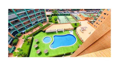 an aerial view of a swimming pool on a building at Lovely penthouse condo with pool in Valencia