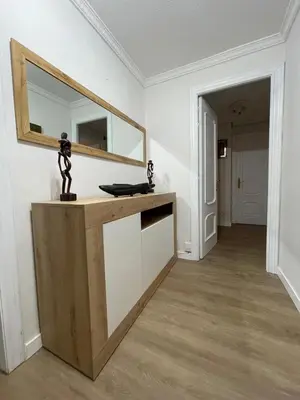a mirror on top of a counter in a room at Jardines del Turia in Valencia