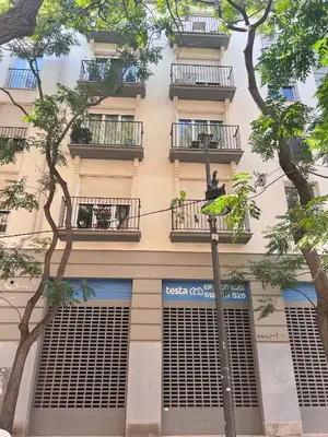 a building with balconies and trees in front of it at Majestic Flats in Valencia