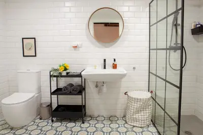 a bathroom with a sink and a toilet and a mirror at NB - Cozy loft steps from City of Arts & Sciences in Valencia