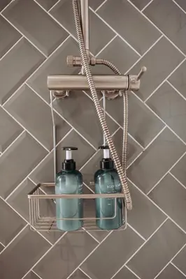 a bathroom with two soap bottles on a shelf at Estelles D Apartment Close To Beach in Valencia