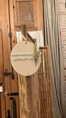 a sign that is hanging on a wall at Design house with swimming pool near the sea in Valencia