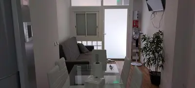 a living room with a couch and a glass table at Lyesblb in Valencia