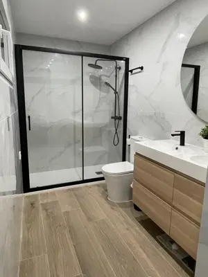 a bathroom with a shower and a toilet and a sink at UIM Mediterraneo PB Luis Vives Wifi in Puerto de Sagunto