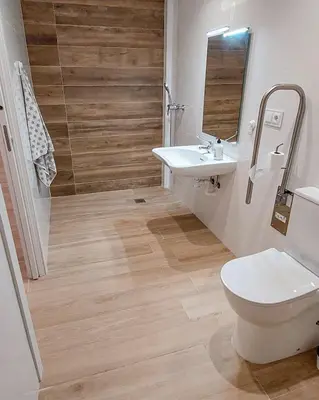 a bathroom with a toilet and a sink at Holiday Hanna’s House in Valencia