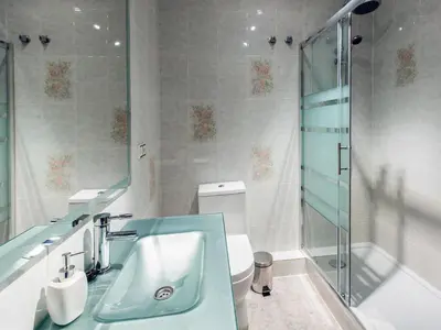 a bathroom with a blue sink and a shower at Total Valencia Xàtiva (Leisure & Culture) in Valencia