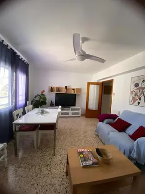a living room with a couch and a table at La Chirrichana 2 in Bicorp