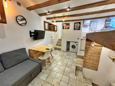 a living room with a couch and a table at Dulces Sueños Pilar in Valencia