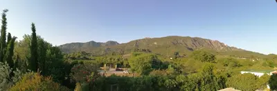a mountain in the distance with trees in front of it at Villa Isabelle in Barraca de Aguas Vivas