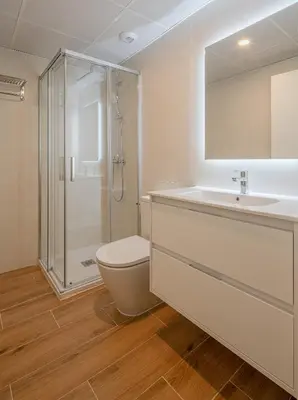 a bathroom with a toilet and a sink and a shower at TOP DUPLEX NUEVO A ESTRENAR ,CIUDAD DE LAS CIENCIAS in Valencia